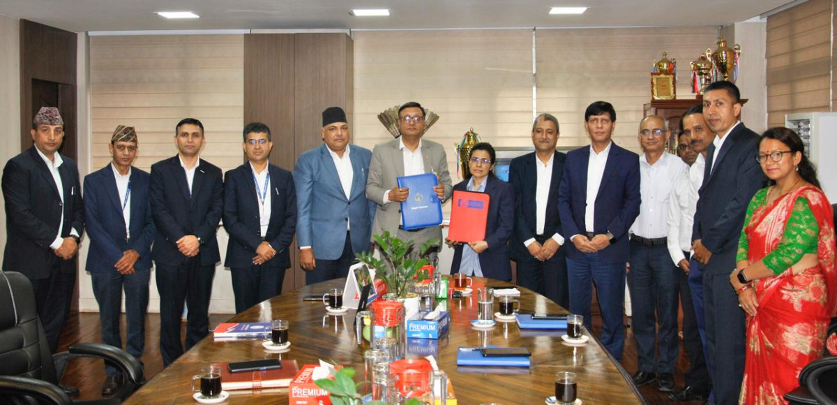 राष्ट्रिय वाणिज्य बैंक र नेपाल टेलिकमबीच सहकार्य सम्झौता